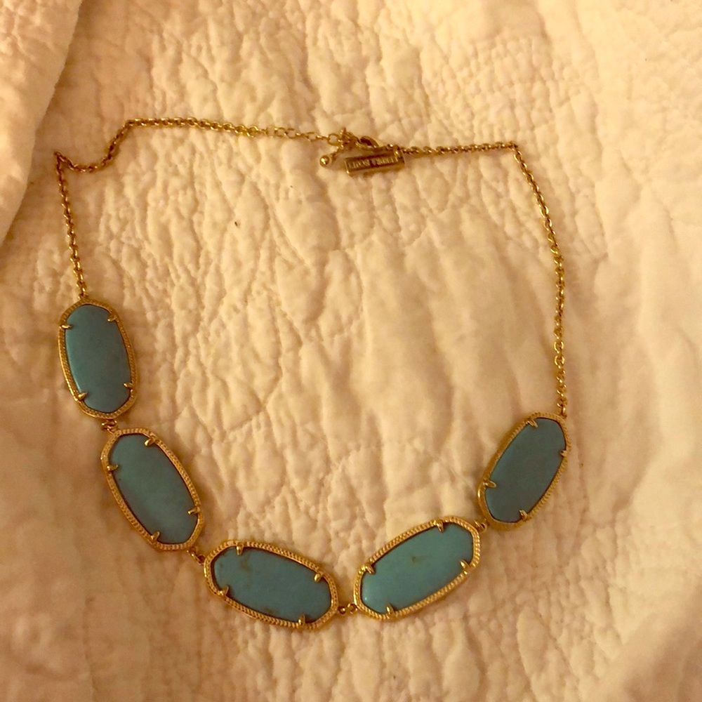 Elle stones lined to make a necklace.